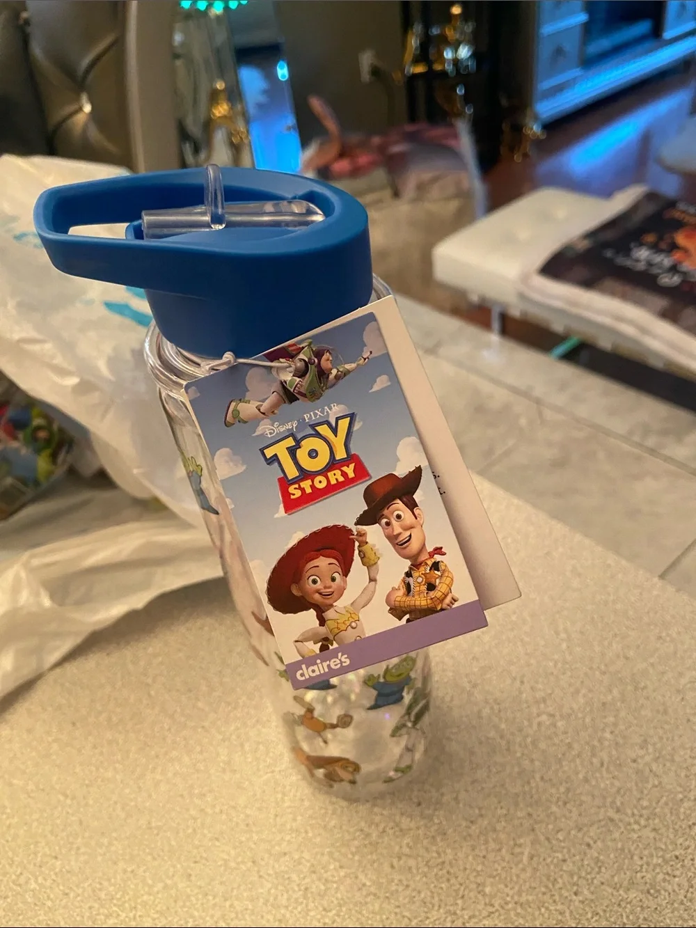 Disney Toy Story Clear Water Bottle with Blue Lid